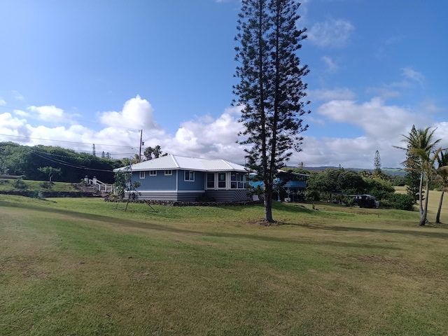94-1770 Kaulua St, Naalehu, HI 96772 - view of green lawn
