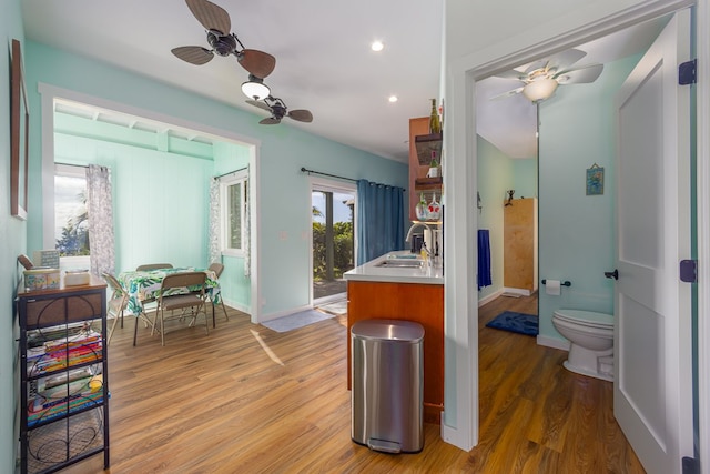 83-1008 Kahula Pl, Captain Cook, HI 96704 - kitchen featuring a ceiling fan, a sink, light wood finished floors, baseboards, and recessed lighting