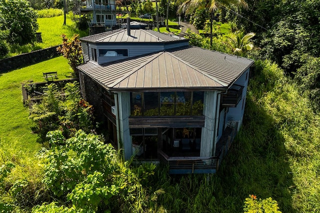 36-2850 Hawaii Belt Rd, Ookala, HI 96774 - back of property with a standing seam roof, metal roof, and a yard