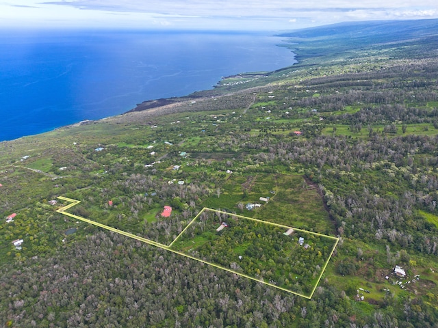 87-2642 Hawaii Belt Rd, Captain Cook, HI 96704 - aerial view of property and surrounding area featuring property boundaries highlighted, a nearby body of water, and a heavily wooded area