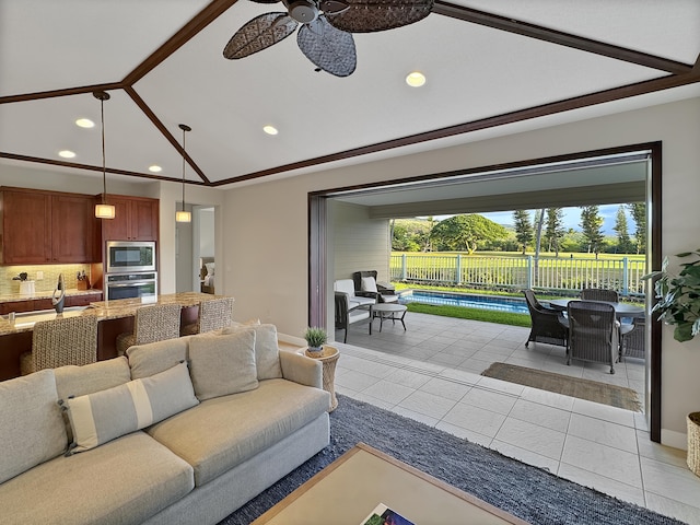 78-122 Holuakai St, Kailua-Kona, HI 96740 - living room with recessed lighting, light tile patterned floors, ceiling fan, lofted ceiling, and baseboards