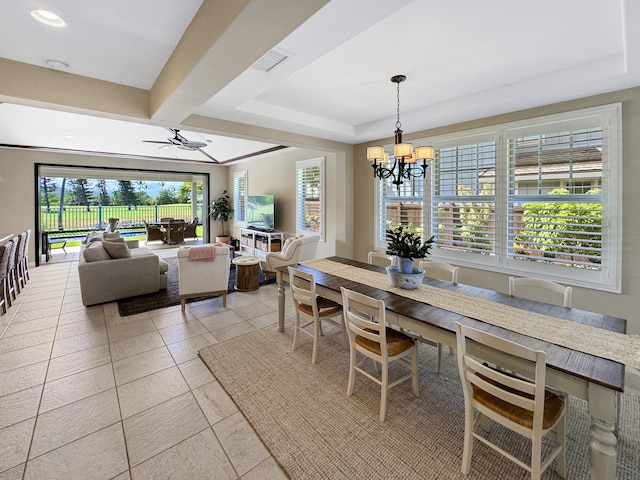 78-122 Holuakai St, Kailua-Kona, HI 96740 - dining room featuring a chandelier, ceiling fan, a tray ceiling, and light tile patterned floors