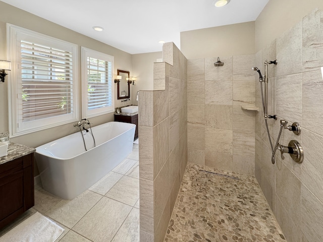 78-122 Holuakai St, Kailua-Kona, HI 96740 - full bathroom featuring vanity, a tile shower, a soaking tub, and recessed lighting