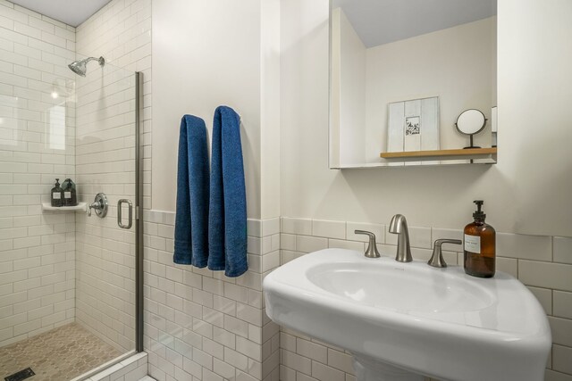 5108 Opelu St, Hanalei, HI 96714 - full bath with a stall shower, a sink, wainscoting, and tile walls