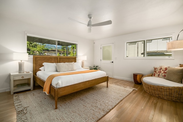 5108 Opelu St, Hanalei, HI 96714 - bedroom with light wood finished floors, baseboards, and a ceiling fan