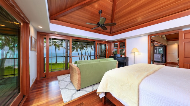5-7834 Kuhio Hwy, Hanalei, HI 96714 - bedroom featuring a water view, wood finished floors, recessed lighting, and baseboards