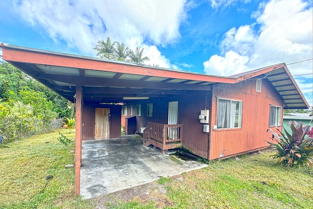 14-3435 Nanawale Blvd, Pahoa, HI 96778 - rear view of property featuring a carport