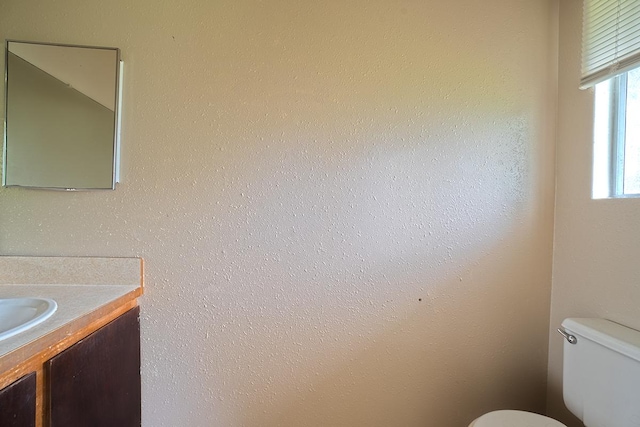 14-3435 Nanawale Blvd, Pahoa, HI 96778 - half bathroom featuring toilet and vanity