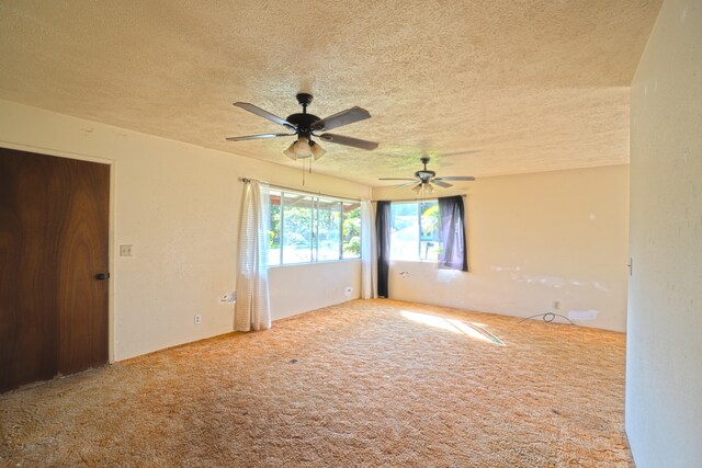 14-3435 Nanawale Blvd, Pahoa, HI 96778 - carpeted empty room featuring a textured ceiling and a ceiling fan
