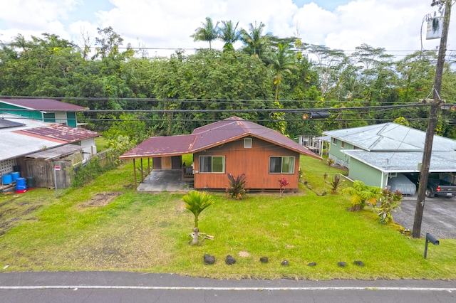 14-3435 Nanawale Blvd, Pahoa, HI 96778 - view of front of property with an attached carport, driveway, and a front yard
