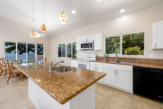 77-6451 Marlin Rd, Kailua-Kona, HI 96740 - kitchen with white range with electric cooktop, black dishwasher, stainless steel microwave, a sink, and recessed lighting