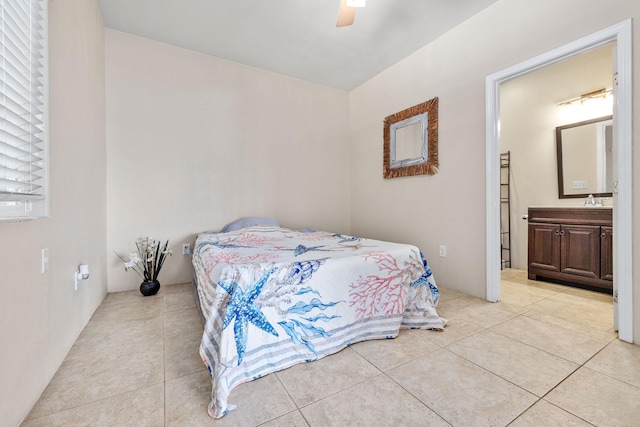77-6451 Marlin Rd, Kailua-Kona, HI 96740 - bedroom with light tile patterned floors, connected bathroom, and ceiling fan