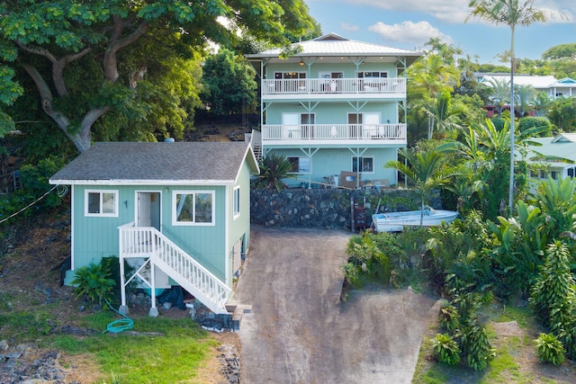 77-6451 Marlin Rd, Kailua-Kona, HI 96740 - view of front of home featuring stairway and roof with shingles