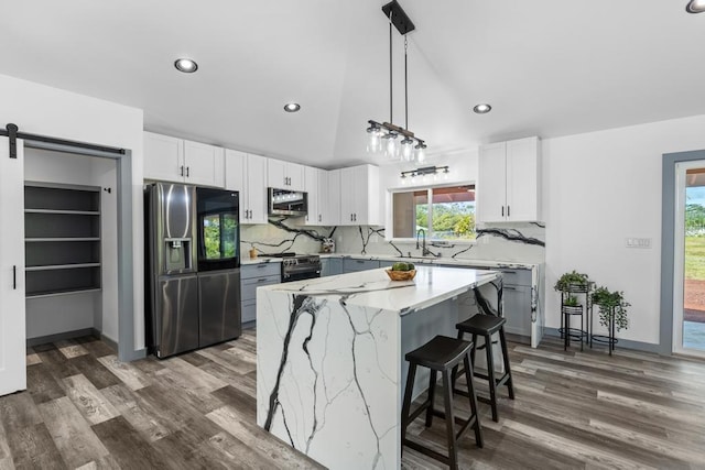 15-1505 14th Ave, Keaau, HI 96749 - kitchen with stainless steel appliances, recessed lighting, a sink, light stone countertops, and dark wood-style floors
