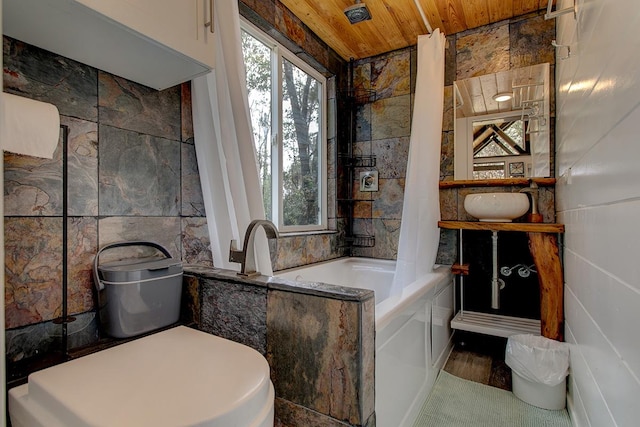 11-3832 3rd St, Volcano, HI 96785 - bathroom with wood ceiling, tile walls, and shower / tub combo with curtain