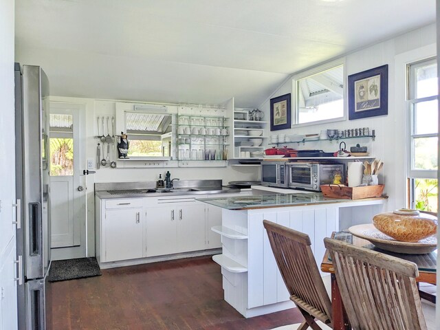18-1262-B Volcano Rd, Mountain View, HI 96771 - kitchen featuring open shelves, stainless steel counters, lofted ceiling, stainless steel refrigerator with ice dispenser, and white cabinets
