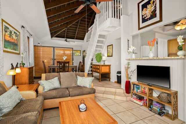 4480 Ka Haku Rd Unit 204, Princeville, HI 96722 - living area with ceiling fan, high vaulted ceiling, tile patterned flooring, and stairs