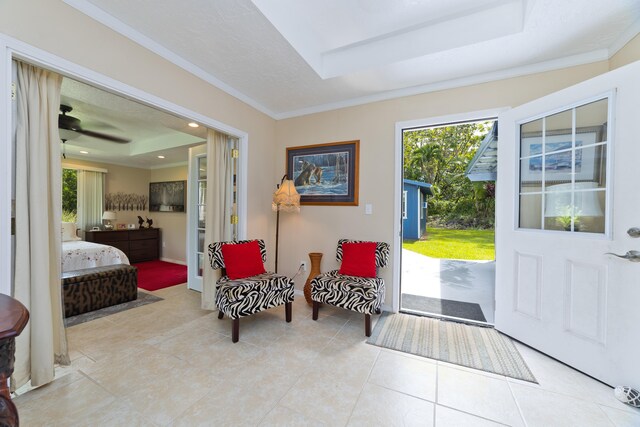 15-2059 10th Ave, Keaau, HI 96749 - foyer entrance featuring ornamental molding, a raised ceiling, light tile patterned floors, baseboards, and recessed lighting