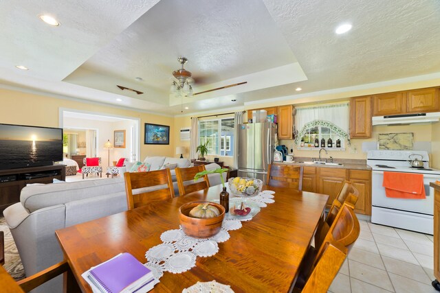 15-2059 10th Ave, Keaau, HI 96749 - dining room featuring a raised ceiling, a textured ceiling, a ceiling fan, light tile patterned flooring, and recessed lighting