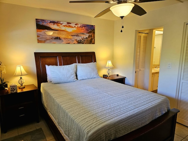 75-6082 Alii Dr Unit A201, Kailua-Kona, HI 96740 - tiled bedroom with ceiling fan and a closet