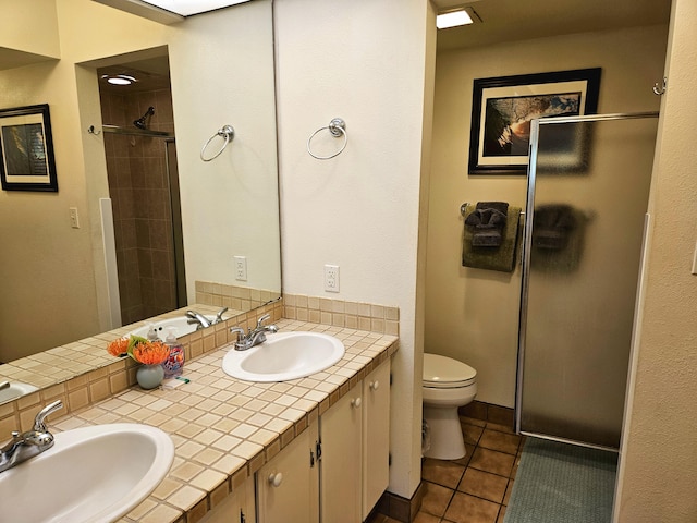 75-6082 Alii Dr Unit A201, Kailua-Kona, HI 96740 - full bath with a shower stall, double vanity, toilet, and tile patterned flooring