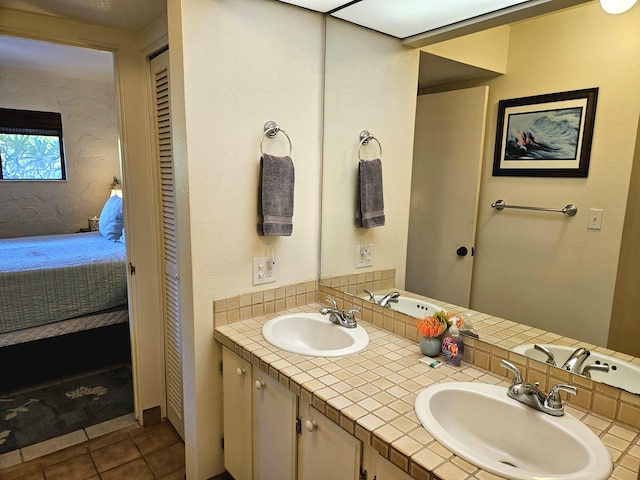 75-6082 Alii Dr Unit A201, Kailua-Kona, HI 96740 - full bath with connected bathroom, double vanity, a closet, and tile patterned floors
