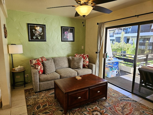 75-6082 Alii Dr Unit A201, Kailua-Kona, HI 96740 - tiled living area with a textured wall and ceiling fan