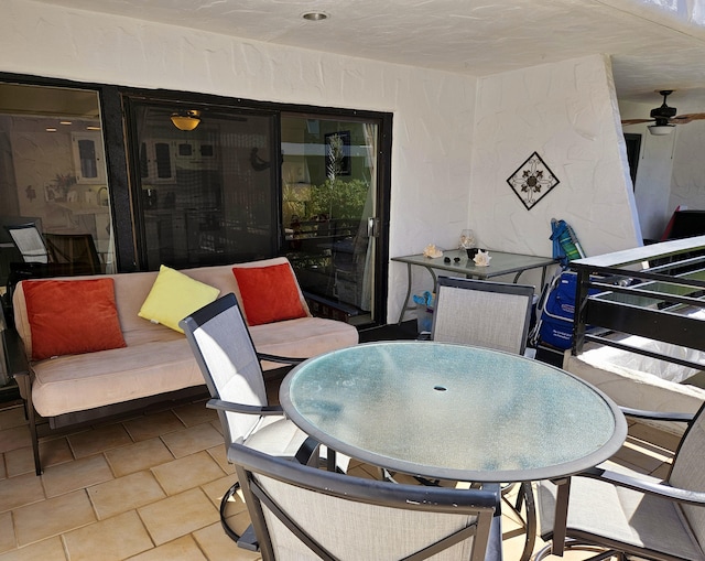 75-6082 Alii Dr Unit A201, Kailua-Kona, HI 96740 - view of patio / terrace with outdoor dining area and a ceiling fan