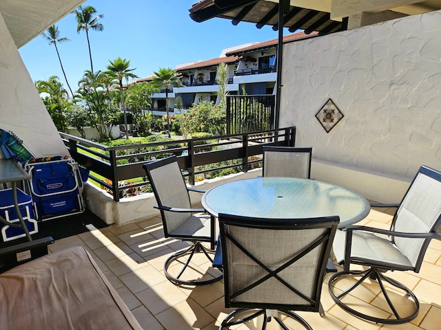 75-6082 Alii Dr Unit A201, Kailua-Kona, HI 96740 - deck with outdoor dining area