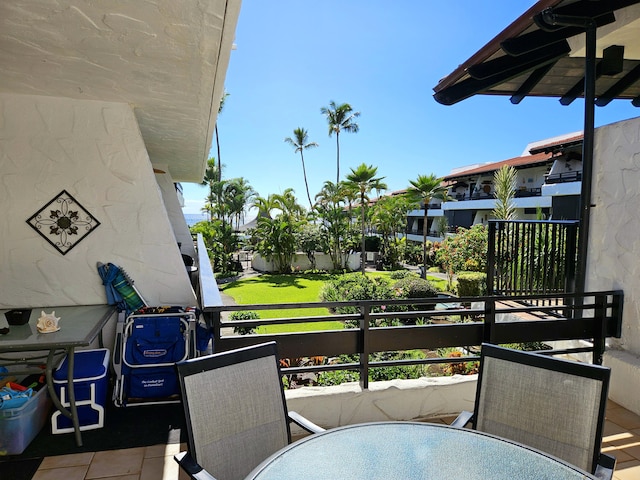 75-6082 Alii Dr Unit A201, Kailua-Kona, HI 96740 - view of patio with a balcony