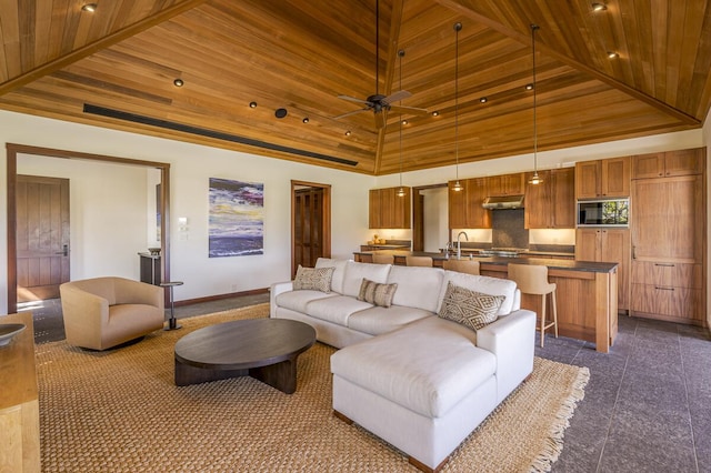 73-4839 Maia Loop Unit 40, Kailua-Kona, HI 96740 - living room featuring wood ceiling, high vaulted ceiling, baseboards, and ceiling fan