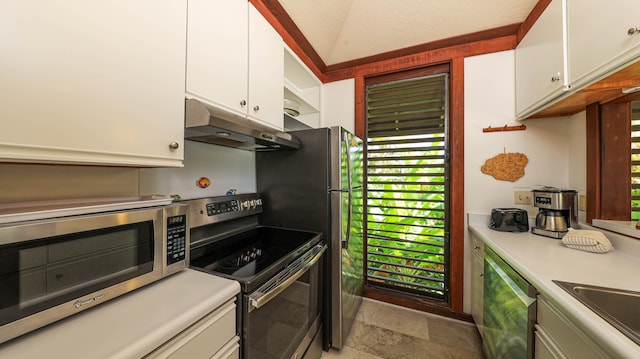 2253 Poipu Rd Unit 170, Koloa, HI 96756 - kitchen with stainless steel appliances, under cabinet range hood, white cabinets, light countertops, and lofted ceiling