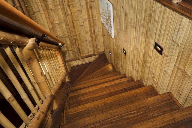 28-3033 Beach Rd, Pepeekeo, HI 96783 - staircase featuring wooden walls