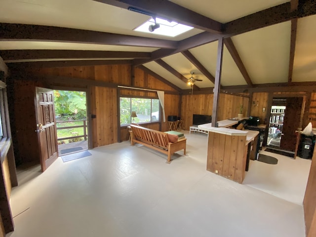 15-2773 Ono St, Pahoa, HI 96778 - kitchen with wooden walls, a ceiling fan, concrete floors, light countertops, and open floor plan