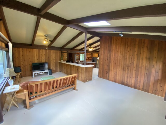 15-2773 Ono St, Pahoa, HI 96778 - living room featuring wood walls and ceiling fan