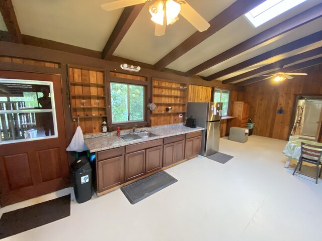 15-2773 Ono St, Pahoa, HI 96778 - kitchen with freestanding refrigerator, a sink, open shelves, a ceiling fan, and wood walls