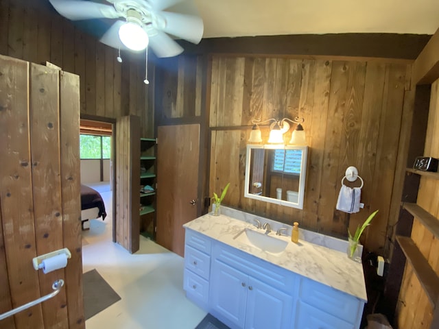15-2773 Ono St, Pahoa, HI 96778 - bathroom with wooden walls, vanity, and a ceiling fan