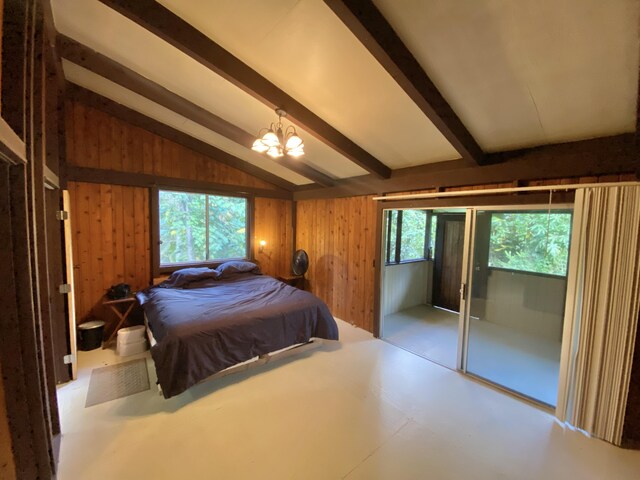 15-2773 Ono St, Pahoa, HI 96778 - bedroom with a chandelier and wood walls