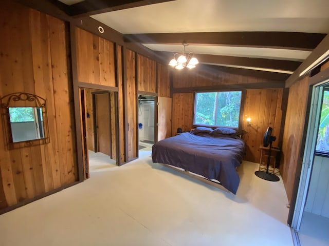 15-2773 Ono St, Pahoa, HI 96778 - bedroom with wooden walls, multiple windows, and a chandelier