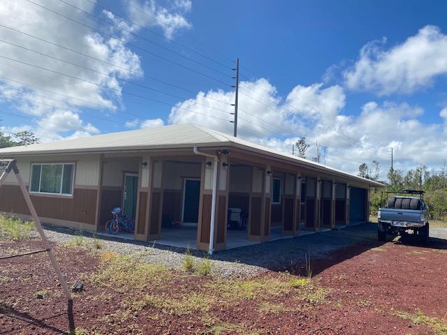15-1852 33rd Ave, Keaau, HI 96749 - view of side of property featuring a patio