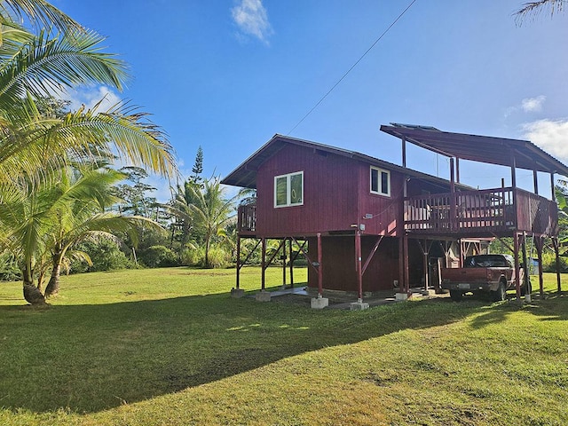 16-1745 35th Ave, Kurtistown, HI 96760 - back of property featuring a deck and a lawn