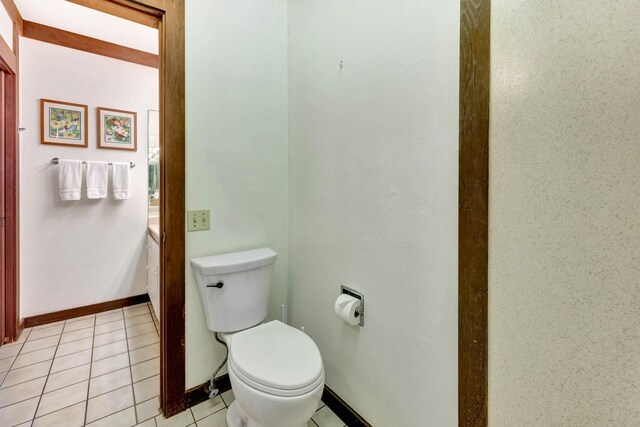 2253 Poipu Rd Unit 138, Koloa, HI 96756 - bathroom with toilet, tile patterned floors, and baseboards