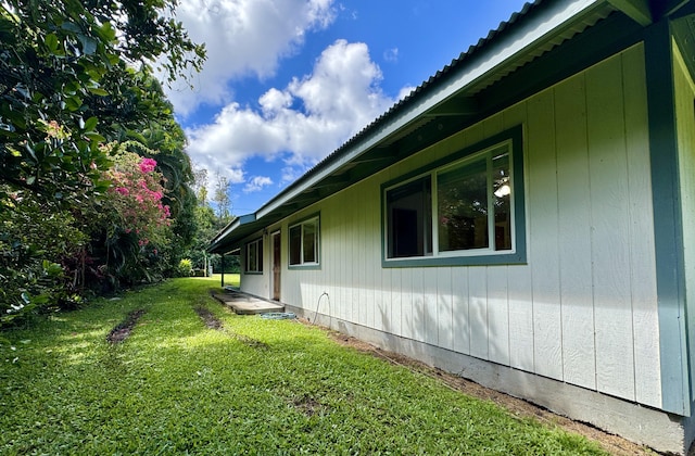 15-2689 Maikoiko St, Pahoa, HI 96778 - view of property exterior with a lawn and metal roof