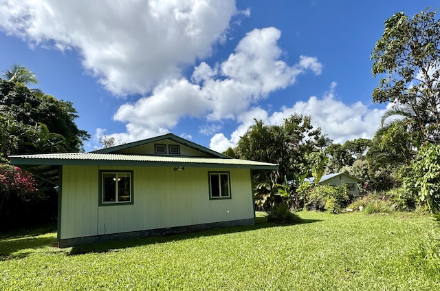 15-2689 Maikoiko St, Pahoa, HI 96778 - view of side of home with a lawn
