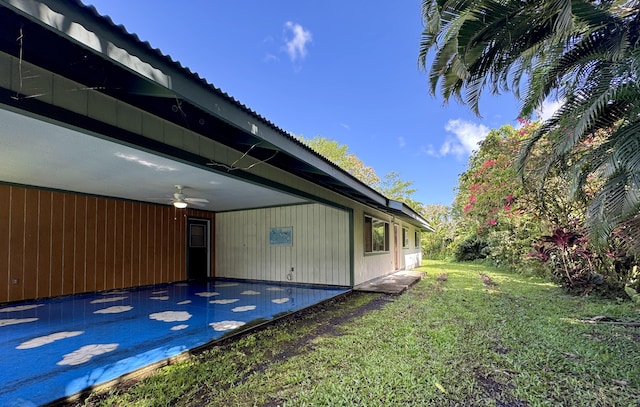 15-2689 Maikoiko St, Pahoa, HI 96778 - view of property exterior featuring ceiling fan and a lawn