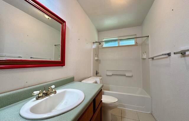 15-2689 Maikoiko St, Pahoa, HI 96778 - bathroom featuring toilet, vanity, tile patterned flooring, bathtub / shower combination, and a textured wall