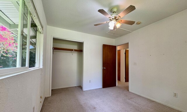 15-2689 Maikoiko St, Pahoa, HI 96778 - unfurnished bedroom featuring attic access, carpet, a closet, baseboards, and ceiling fan