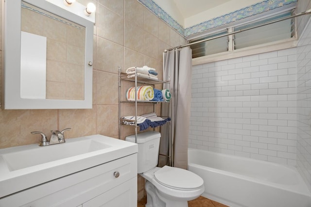 5060 Nonou Rd, Kapaa, HI 96746 - full bath with tile walls, toilet, vanity, and shower / bathtub combination with curtain