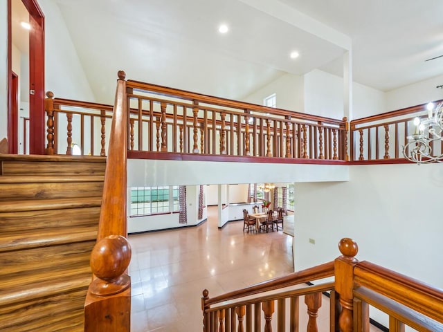 2089 Kinoole St, Hilo, HI 96720 - stairway with recessed lighting, a chandelier, and tile patterned floors