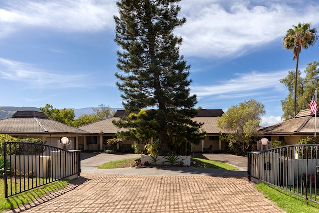 71-1638 Puu Napoo Dr, Kailua-Kona, HI 96740 - view of front of property featuring decorative driveway and an attached garage